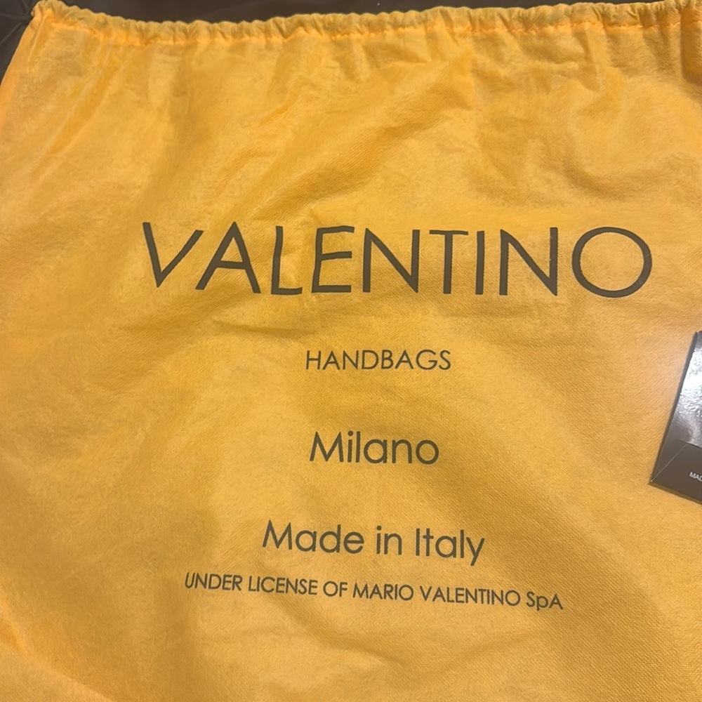 Valentino by Mario. Made in Italy.